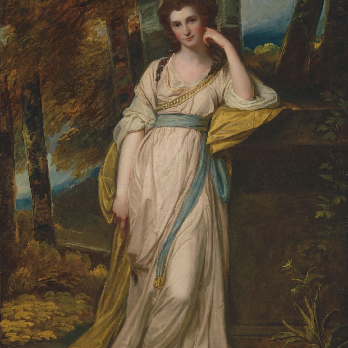 George Romney — Портрет миссис Деборы Джемаймы Максвелл (1755-1789) в полный рост, в бледно-розовом платье с голубым поясом и желтой накидке, на фоне лесистого пейзажа, изображение 1