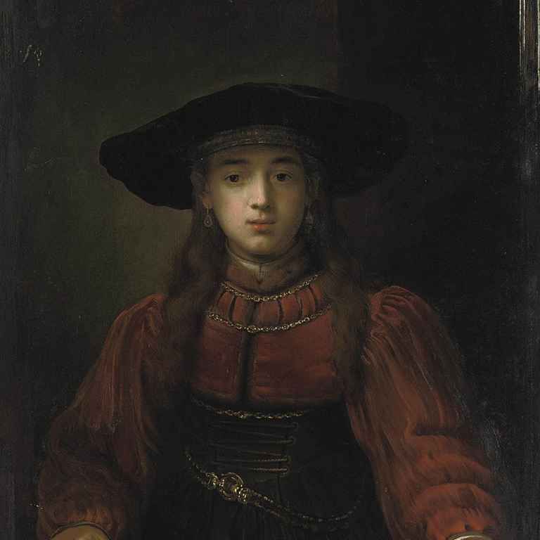 Rembrandt van Rijn — Портрет молодой девушки в полный рост, в красном платье с меховой отделкой, корсете с пряжками и меховой шапочке