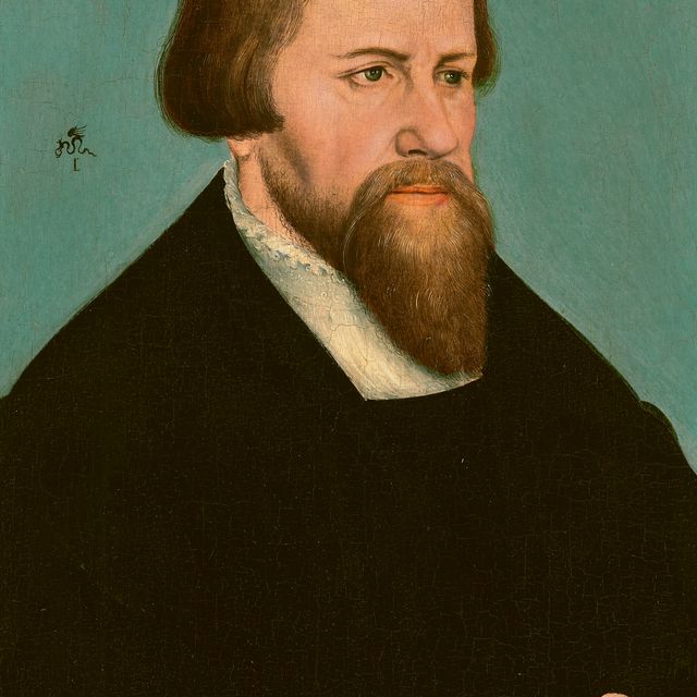 Lucas Cranach The Younger — Портрет Каспара Круцигера (1504-1548), во весь рост, с книгой в руках