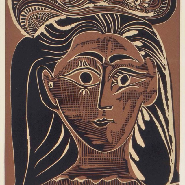 Pablo Picasso — Женщина в головной убор с цветами