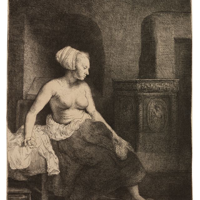 Rembrandt van Rijn — Полуодетая женщина сидит у плиты