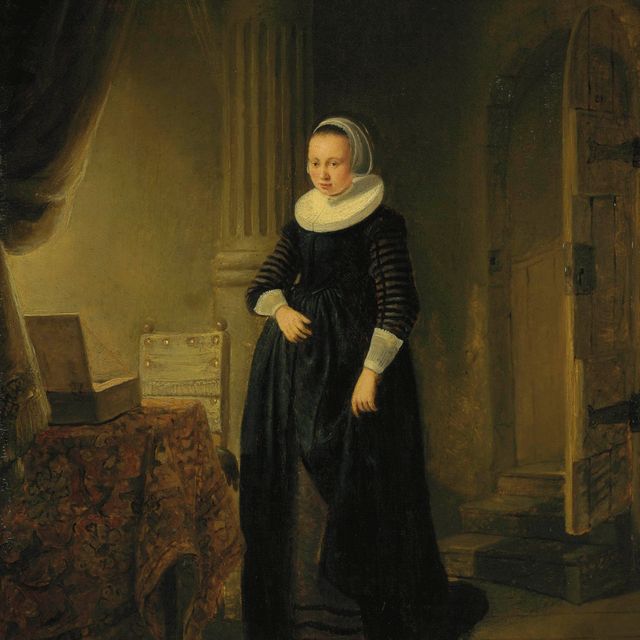 Rembrandt van Rijn — Молодая женщина в интерьере