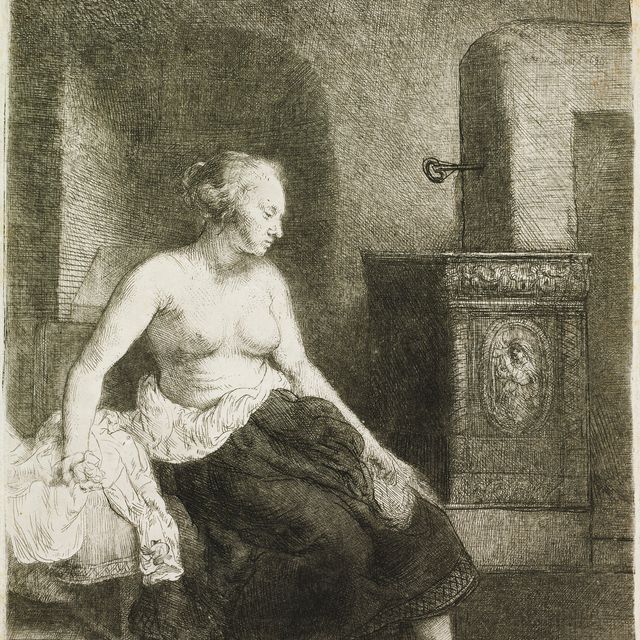 Rembrandt van Rijn — Полуодетая женщина сидит у плиты