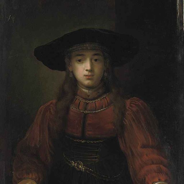 Rembrandt van Rijn — Портрет молодой девушки в полный рост, в красном платье с меховой отделкой, корсете с пряжками и меховой шапочке